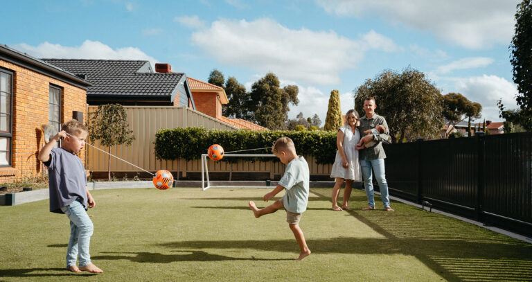 a family playing in a front yard in Melbourne Australia