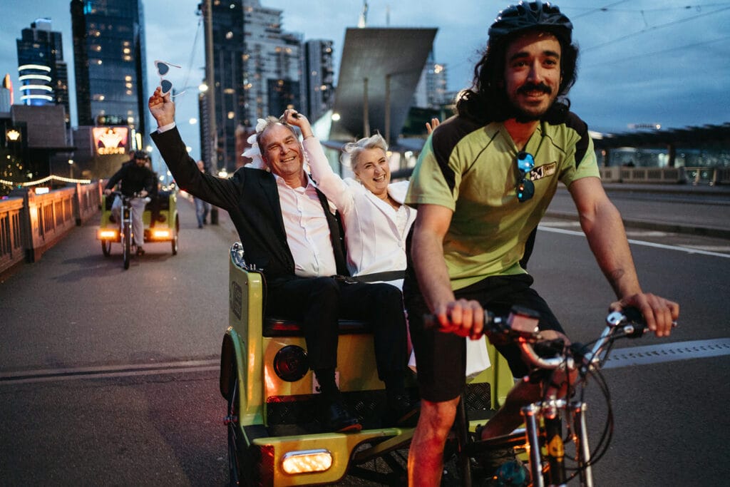 Eco wedding transport a couple ride in a pedal cab around Melbourne